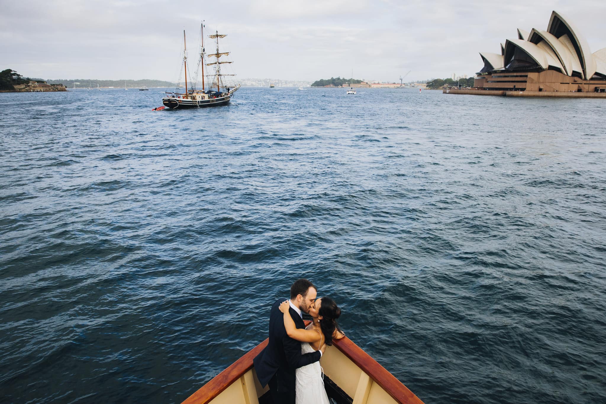Bride and Groom on Boat Bow on Sydney Harbour